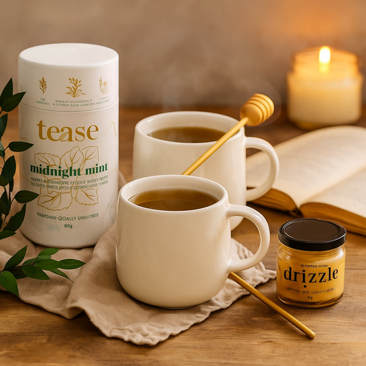 Enjoyed Midnight Mint tea with honey generously scooped with a gold honey dipper in these white porcelain cups.